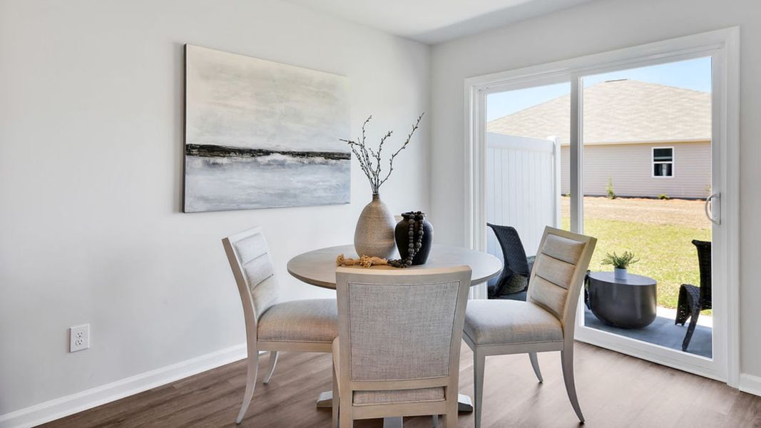 Representative furnished interior of a home built from the MITCHELL TOWNHOME by D.R. Horton in Grayson Park Townhomes, Leland (Image 9). Representative furnished interior of a home built from the MITCHELL TOWNHOME by D.R. Horton in Grayson Park Townhomes, Leland (Image 9).