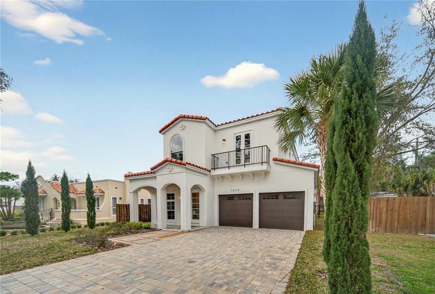 Front exterior of a new home in , Winter Park, FL, highlighting curb appeal (Image 22). Front exterior of a new home in , Winter Park, FL, highlighting curb appeal (Image 22).