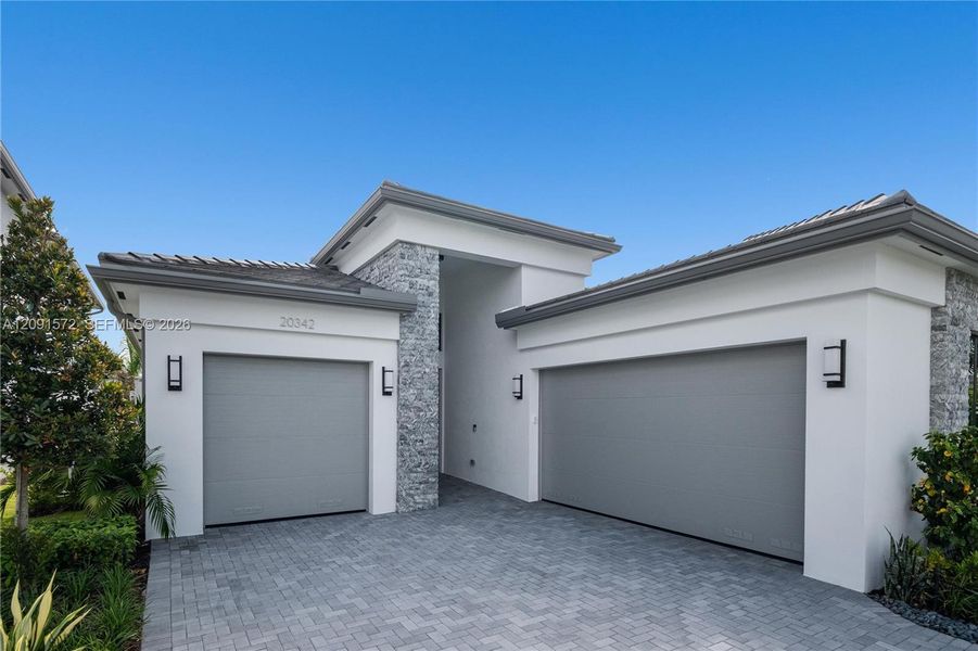 Front exterior of a new home in , Boca Raton, FL, highlighting curb appeal (Image 25). Front exterior of a new home in , Boca Raton, FL, highlighting curb appeal (Image 25).