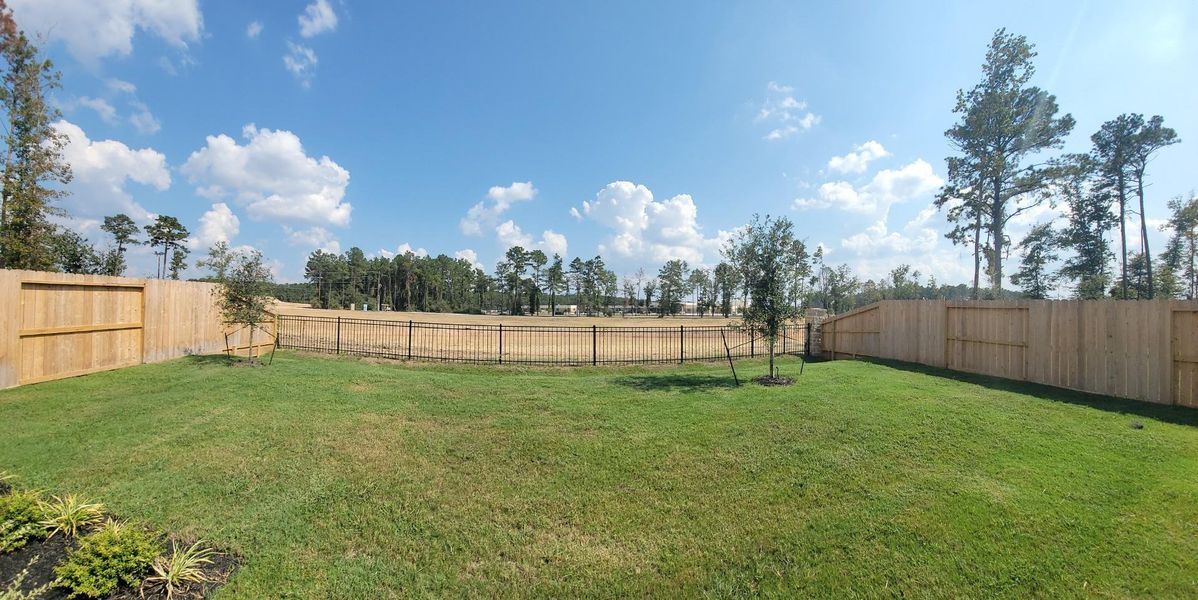 Exterior details and patio area of a home in The Highlands, Porter (Image 3). Exterior details and patio area of a home in The Highlands, Porter (Image 3).
