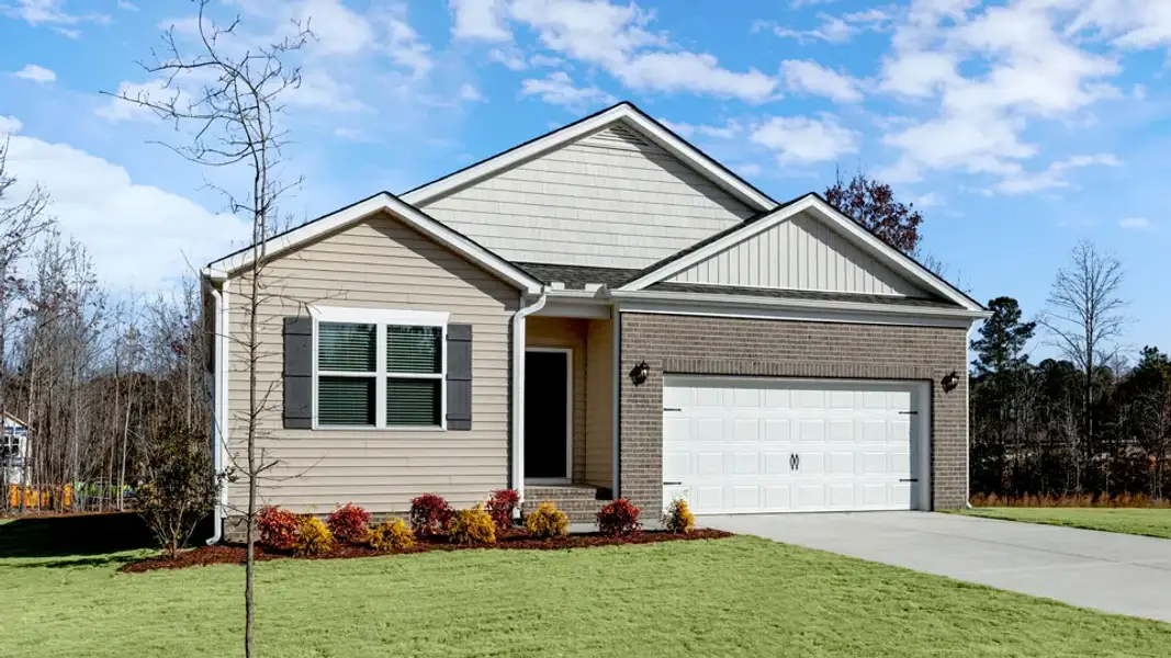 Front exterior of a new home in Baker Farm, Youngsville, NC, highlighting curb appeal (Image 18).