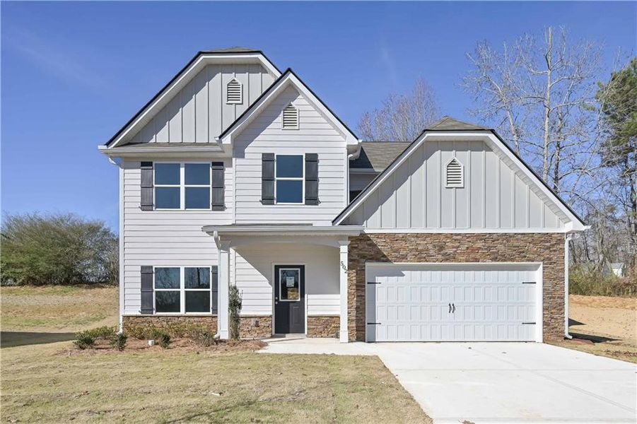 Front exterior of a new home in , Villa Rica, GA, highlighting curb appeal (Image 1). Front exterior of a new home in , Villa Rica, GA, highlighting curb appeal (Image 1).