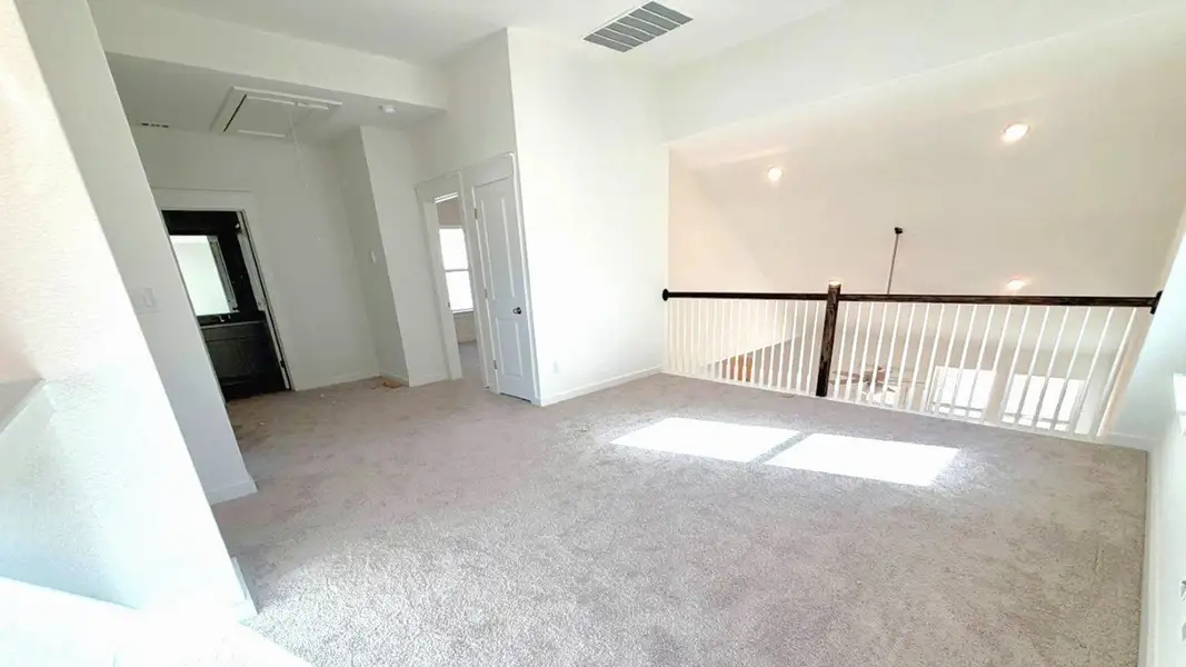 Furnished interior view inside a new home in Flora, Hutto (Image 4).
