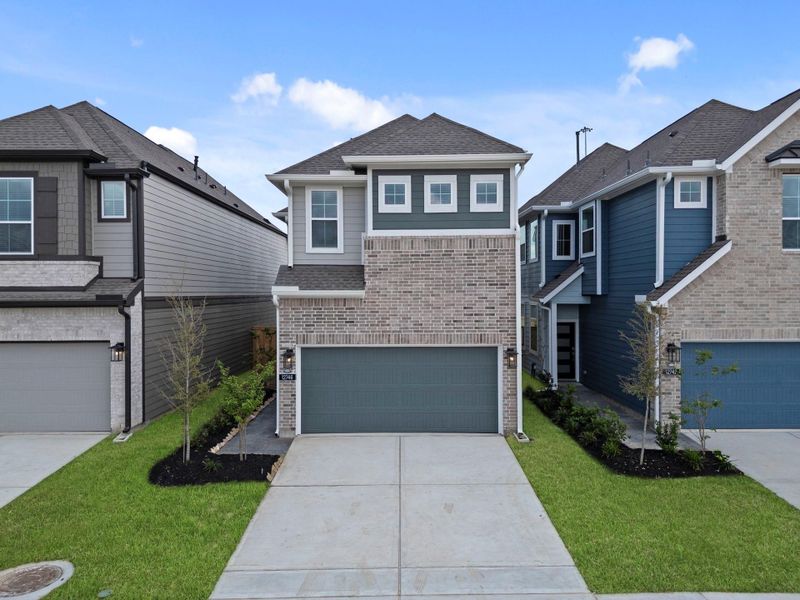 Front exterior of a new home in Bridgeland, Cypress, TX, highlighting curb appeal (Image 16). Front exterior of a new home in Bridgeland, Cypress, TX, highlighting curb appeal (Image 16).