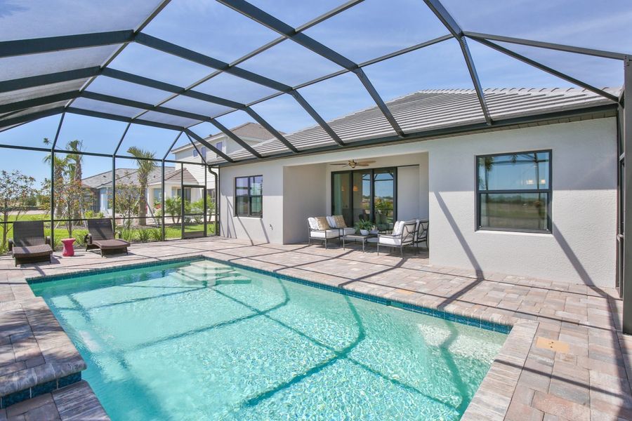 Exterior details and patio area of a home in Palm Grove, Lakewood Ranch (Image 26).