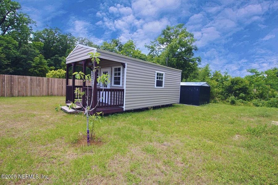 Front exterior of a new home in , Jacksonville, FL, highlighting curb appeal (Image 19).