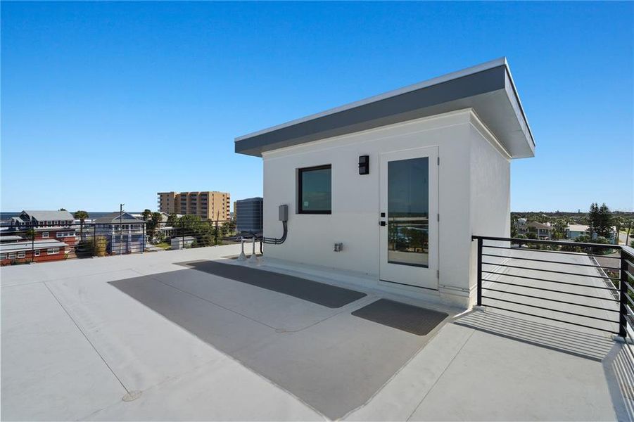 Exterior details and patio area of a home in , New Smyrna Beach (Image 54).