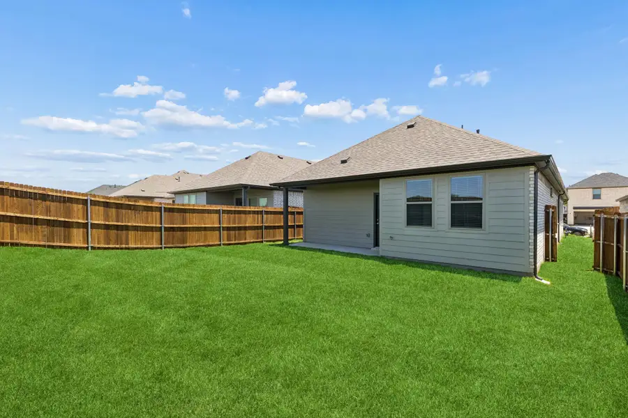 Covered Patio in the Cypress home plan by Trophy Signature Homes - REPRESENTATIVE PHOTO Covered Patio in the Cypress home plan by Trophy Signature Homes - REPRESENTATIVE PHOTO
