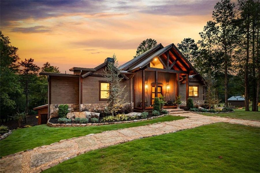 Front exterior of a new home in , Epworth, GA, highlighting curb appeal (Image 23).
