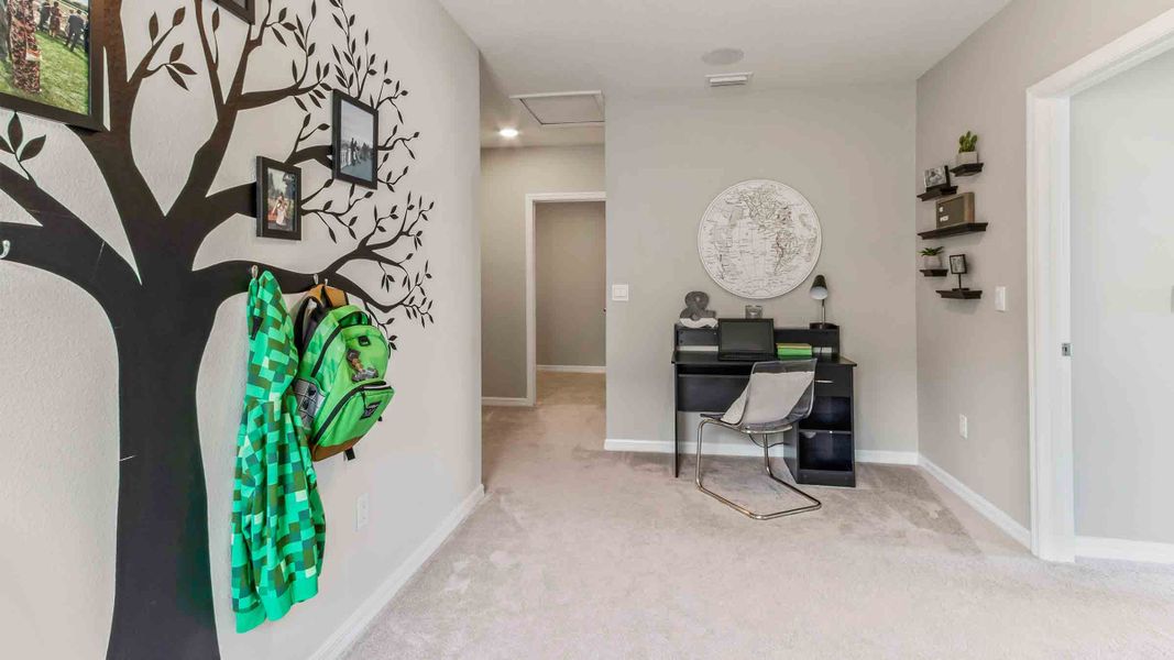 Representative furnished interior of a home built from the Robie Modern by D.R. Horton in Archer at Two Rivers, Zephyrhills (Image 12).