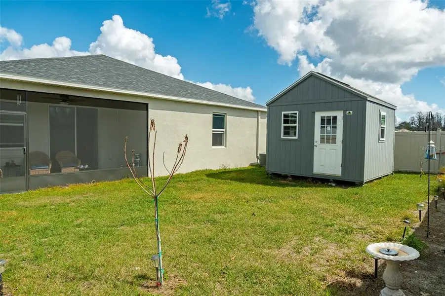 Exterior details and patio area of a home in , Land O' Lakes (Image 22).