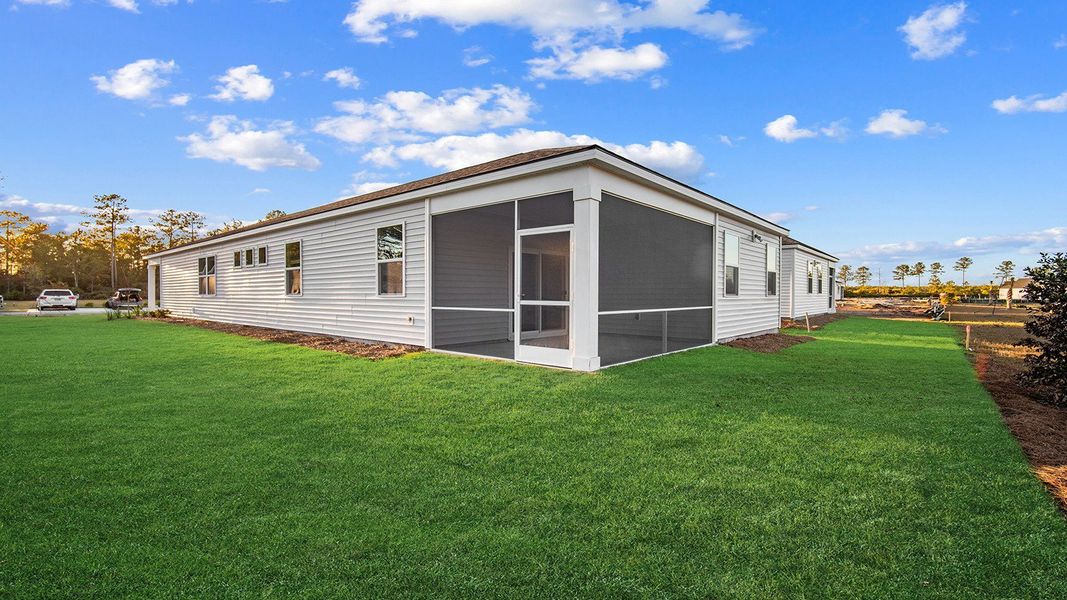 Exterior details and patio area of a home in The Lakes at North Glynn, Brunswick (Image 5).