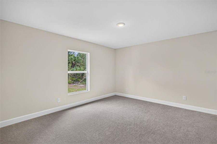 Spacious, unfurnished interior of a new home in , Port Charlotte (Image 21).