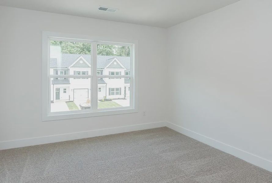 Representative unfurnished interior of a home built from the 1808 Townhome by Adams Homes in Parkstone Place Townhomes, Roebuck (Image 23). Representative unfurnished interior of a home built from the 1808 Townhome by Adams Homes in Parkstone Place Townhomes, Roebuck (Image 23).