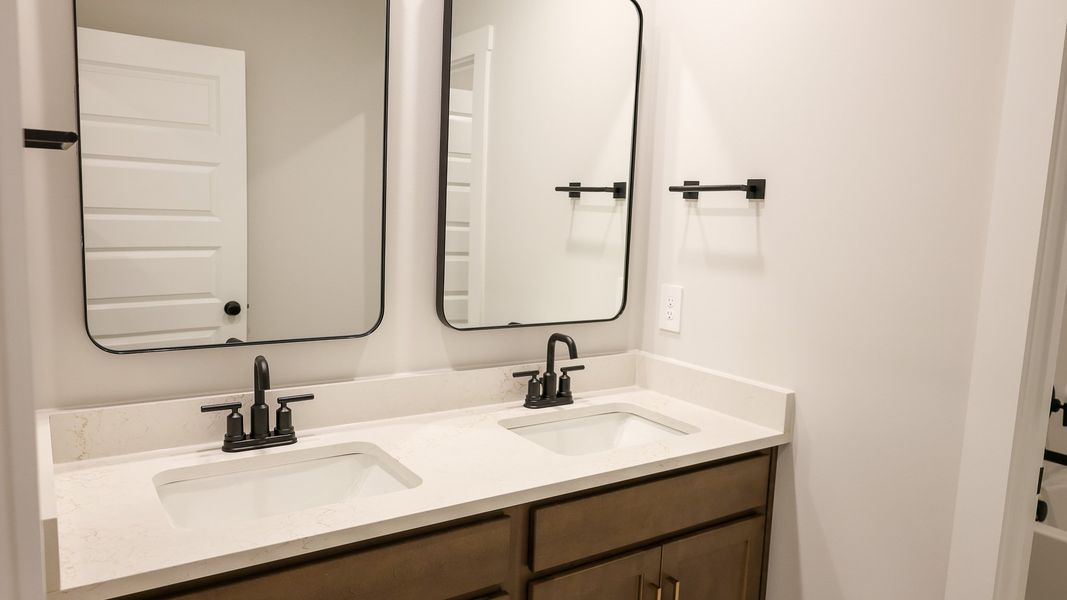 Representative furnished interior of a home built from the EMBRY by D.R. Horton in Harvest Point, Spring Hill (Image 18).