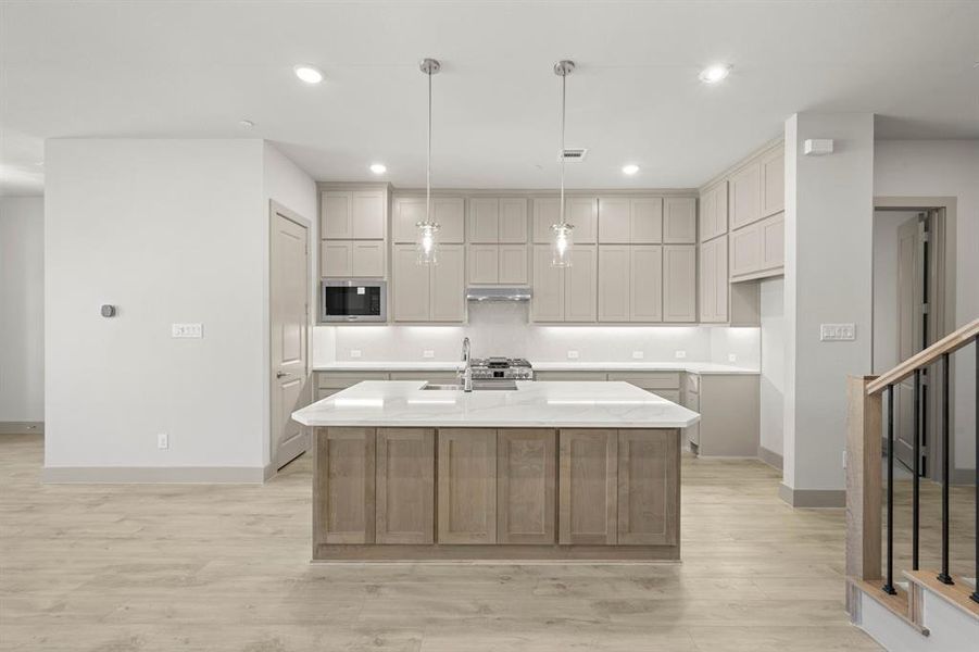 Furnished interior view inside a new home in , Farmers Branch (Image 4).