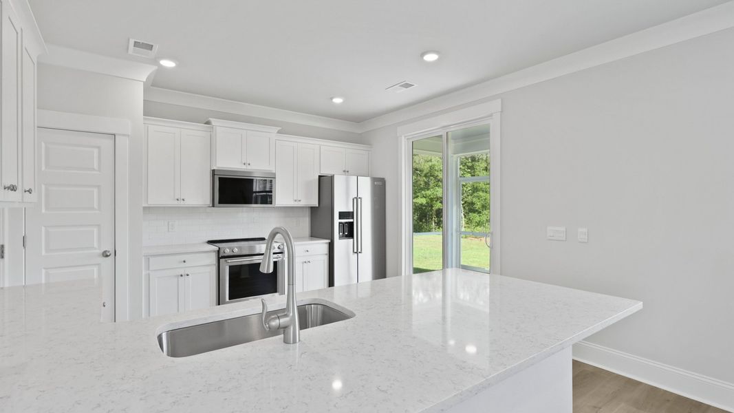 Representative furnished interior of a home built from the HARRIS by D.R. Horton in Sheep Island, Summerville (Image 5).