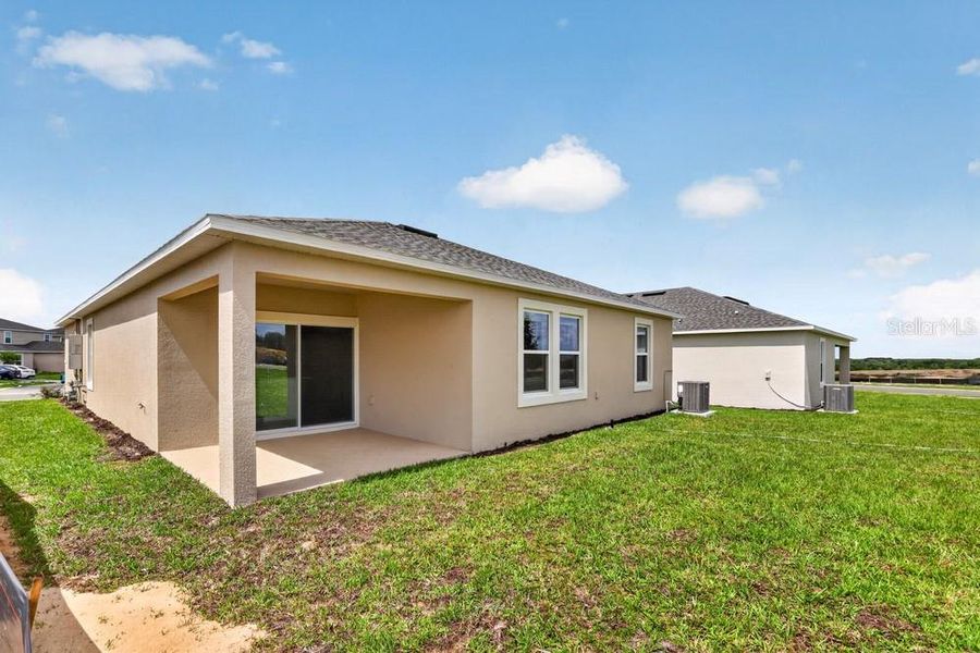 Exterior details and patio area of a home in Waterstone, Groveland (Image 31).