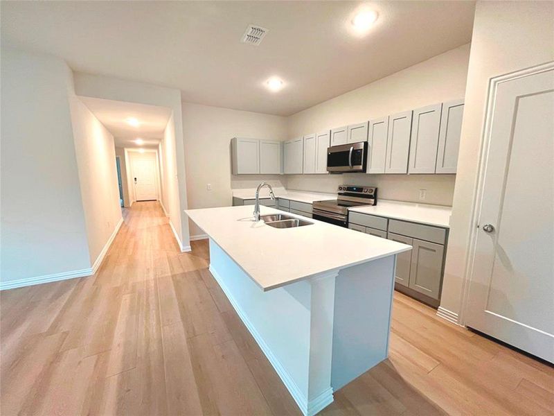Furnished interior view inside a new home in Labein Villas, Greenville (Image 7).
