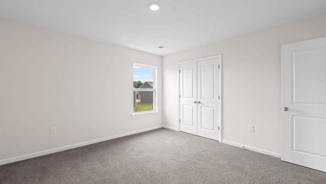 Representative unfurnished interior of a home built from the BILTMORE by D.R. Horton in Waverly Station, Greenwood (Image 20).