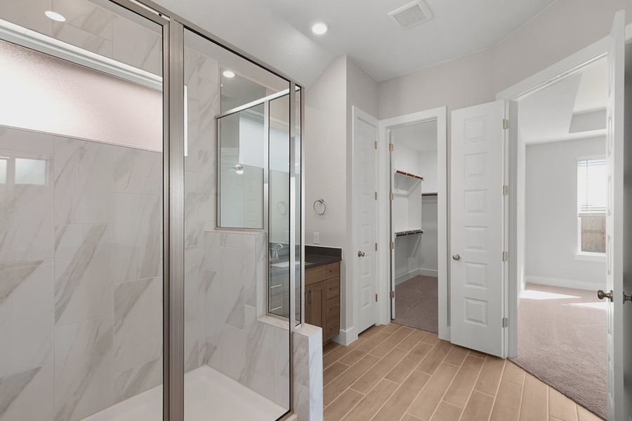 Representative furnished interior of a home built from the Lucas by Chesmar Homes in Lariat, Liberty Hill (Image 5).