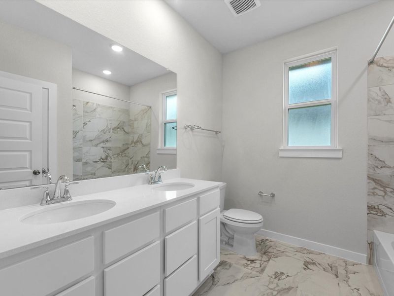 Furnished interior view inside a new home in Mason Woods, Cypress (Image 8).