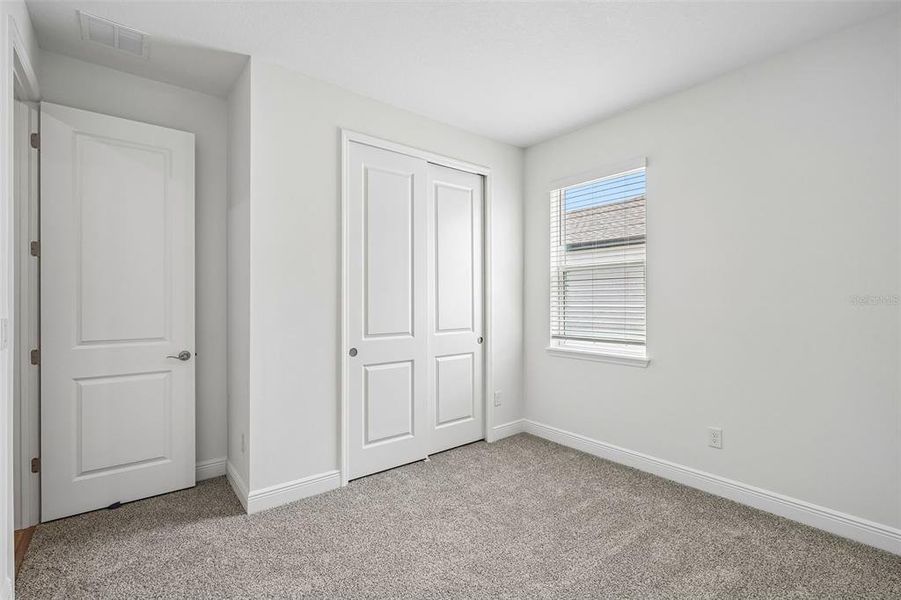 Spacious, unfurnished interior of a new home in Legends Preserve - Signature Series, Daytona Beach (Image 29).