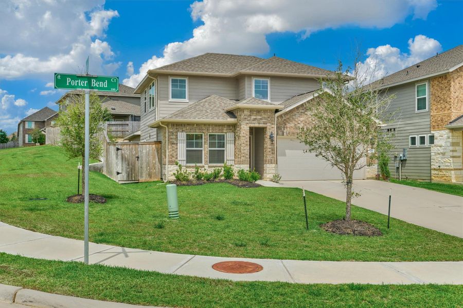 Front exterior of a new home in , Montgomery, TX, highlighting curb appeal (Image 20).