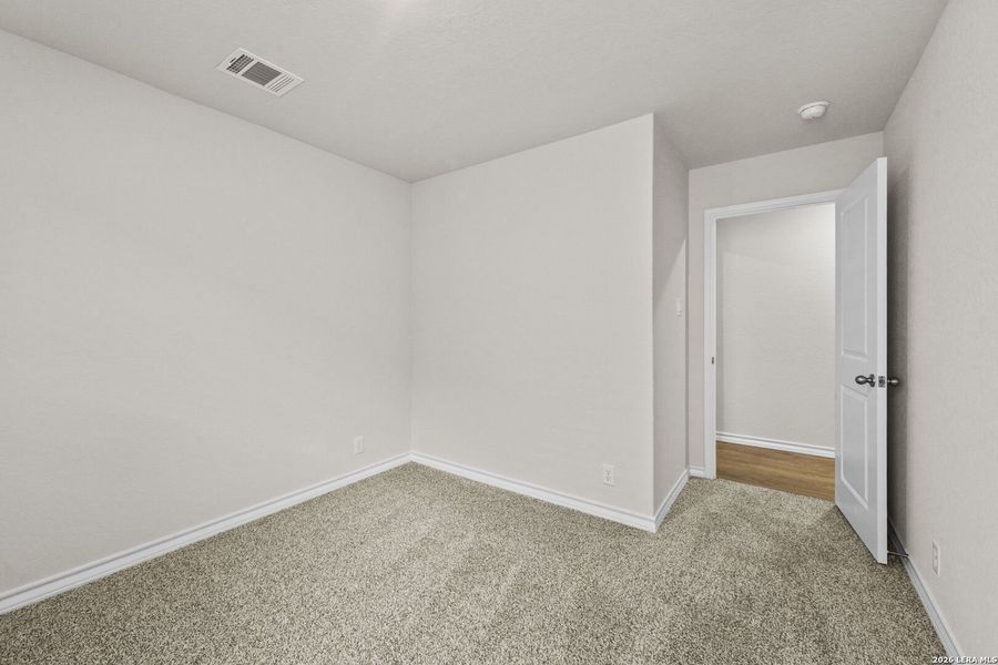 Spacious, unfurnished interior of a new home in Brookstone Creek, San Antonio (Image 12).