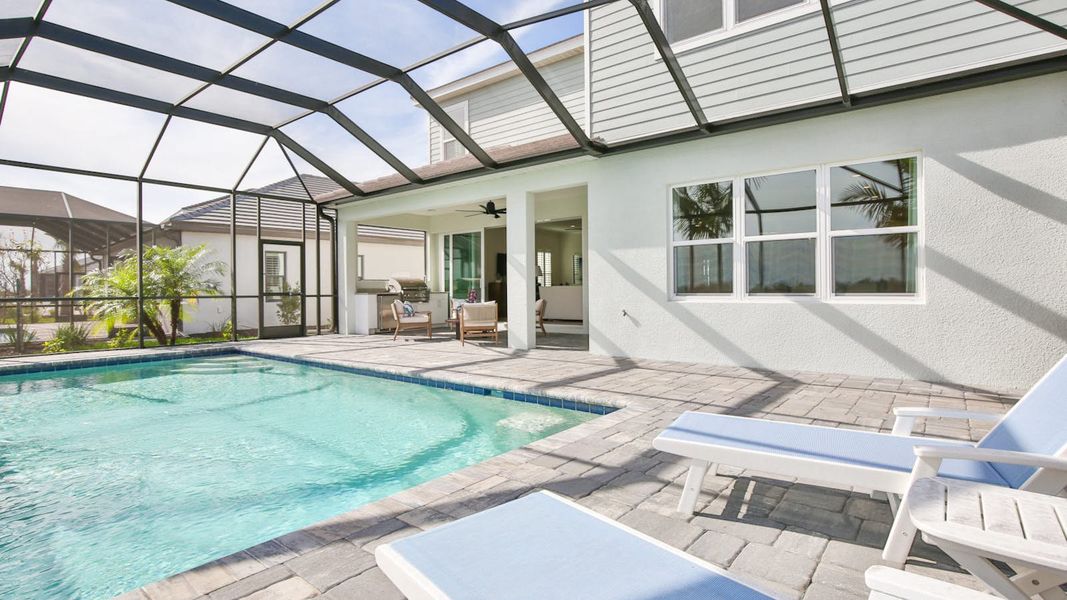 Exterior details and patio area of a home in Palm Grove, Lakewood Ranch (Image 28).