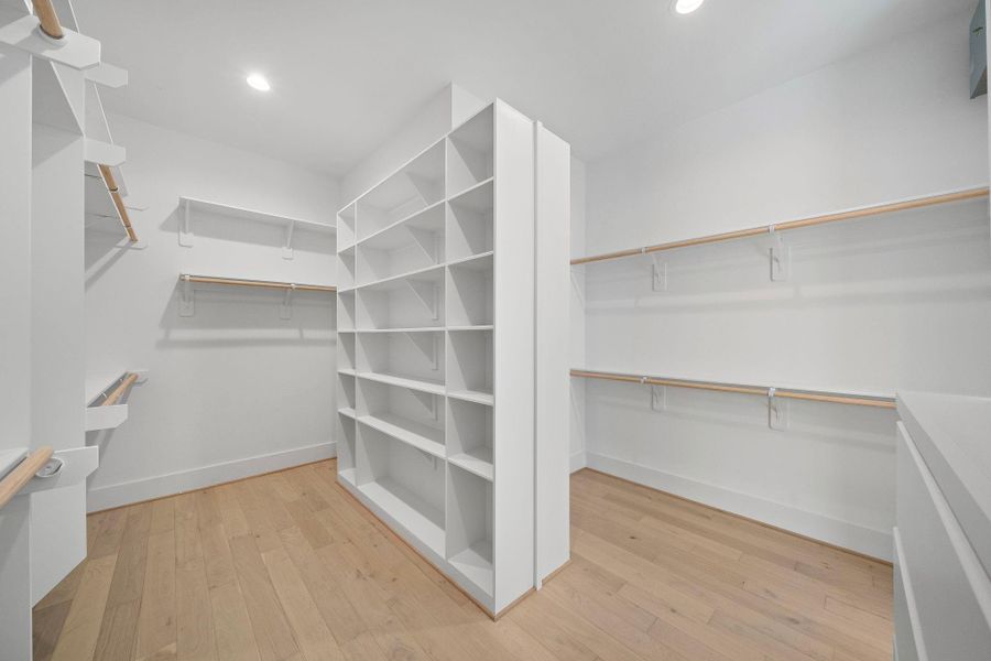 HUGE walk-in closet with built-ins and plenty of space to keep organized. This is one of two master closets. (Photos are of a previously completed home. Finishes are subject to change.) HUGE walk-in closet with built-ins and plenty of space to keep organized. This is one of two master closets. (Photos are of a previously completed home. Finishes are subject to change.)