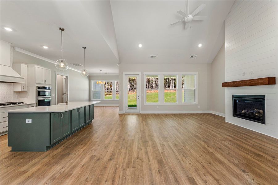 Great room / kitchen - Images are of a different h