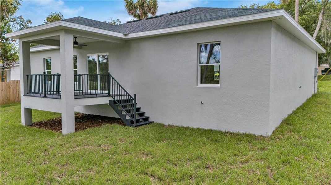 Exterior details and patio area of a home in , Orange City (Image 15).