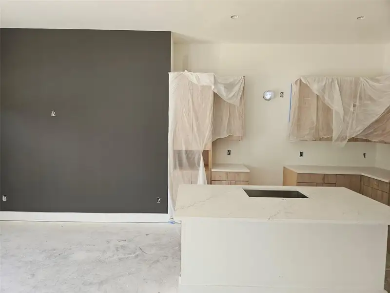 Another view of the stunning accent wall and kitchen. Another view of the stunning accent wall and kitchen.