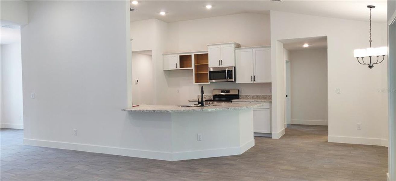 Furnished interior view inside a new home in Royal Highlands, Weeki Wachee (Image 6).