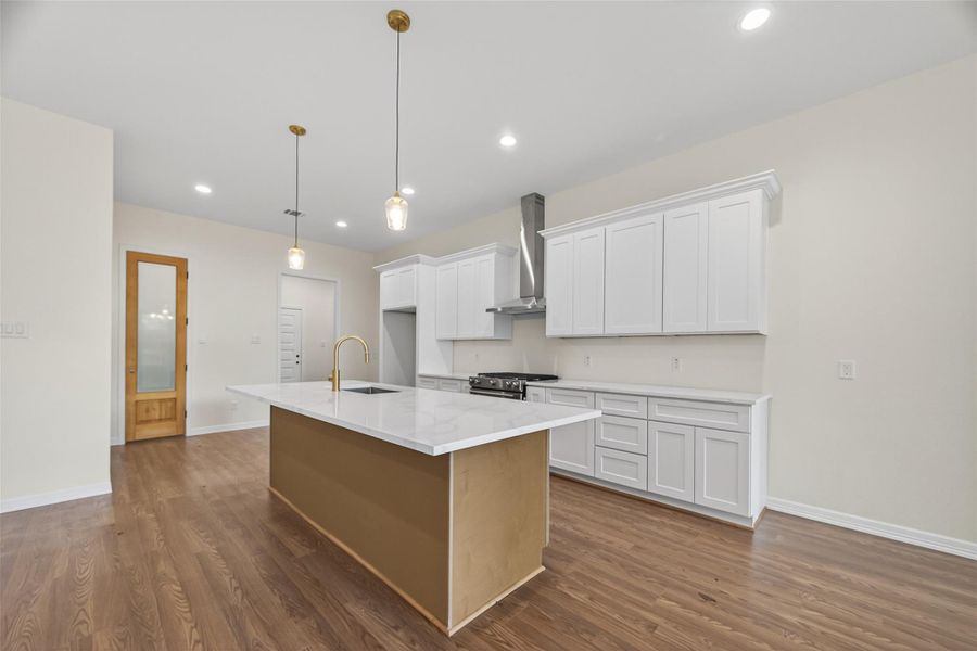 KITCHEN GAS STOVE, STAINLESS STEEL STOVE AND DISHWASHER. 8FT DOOR LEADS TO PANTRY. OTHER ENTRY LEADS TO MUD ROOM. NEXT TO MUD ROOM IS LAUNDRY ROOM.  OPEN HOUSE NOVEMBER 30 1-3PM