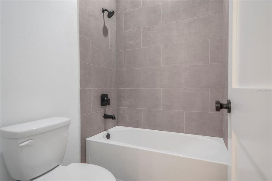 Furnished interior view inside a new home in , Dunnellon (Image 7).