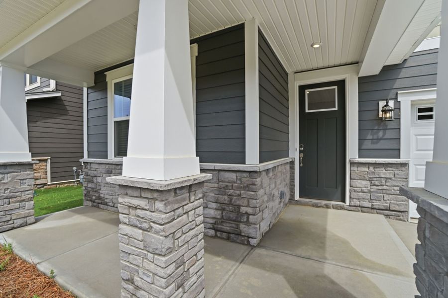 Exterior details and patio area of a home in Waxhaw Landing, Monroe (Image 3).