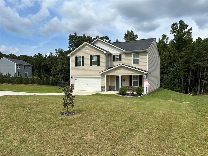 Front exterior of a new home in , Cedartown, GA, highlighting curb appeal (Image 19).