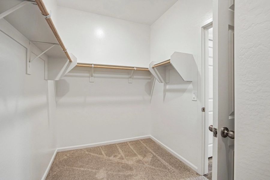 Primary walk in closet Primary walk in closet