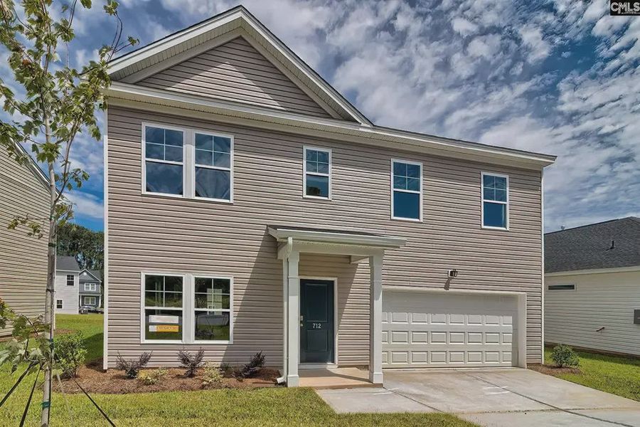 Front exterior of a new home in Emanuel Creek, West Columbia, SC, highlighting curb appeal (Image 2).
