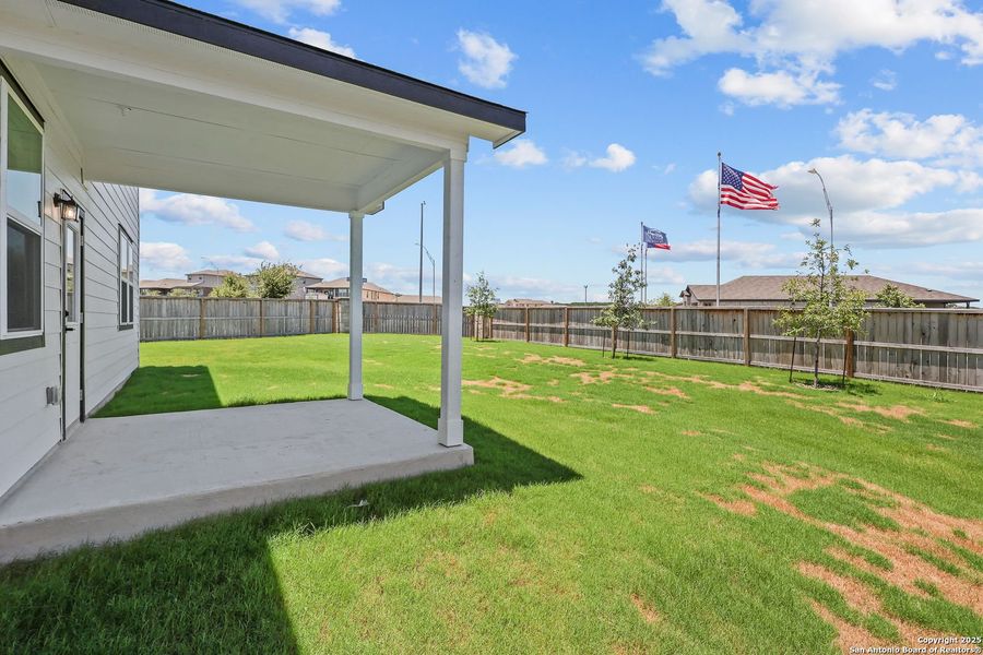 Front exterior of a new home in Comanche Ridge, San Antonio, TX, highlighting curb appeal (Image 73). Front exterior of a new home in Comanche Ridge, San Antonio, TX, highlighting curb appeal (Image 73).