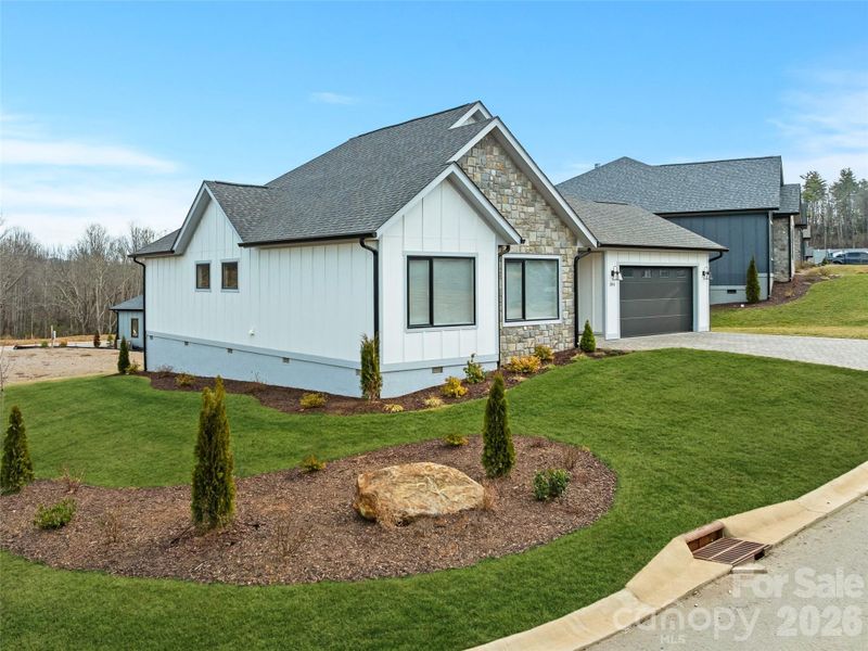 Front exterior of a new home in , Arden, NC, highlighting curb appeal (Image 2).