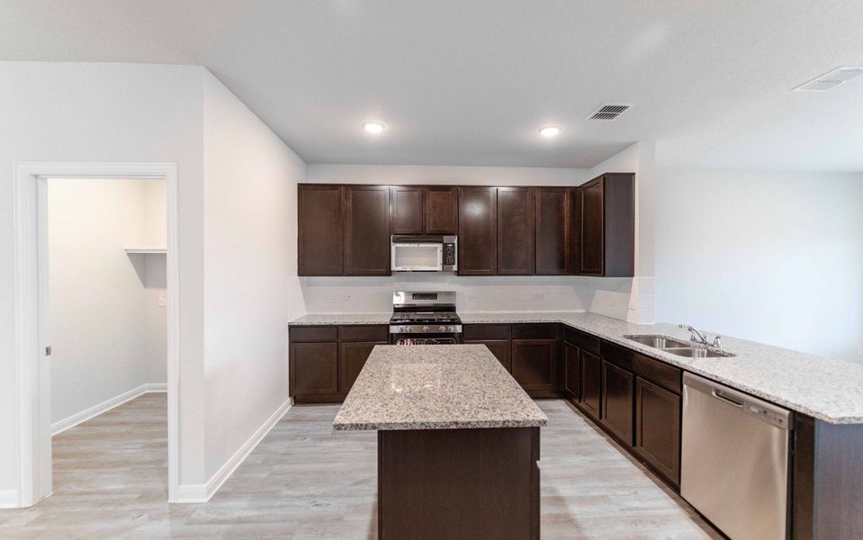 Furnished interior view inside a new home in Hickory Ridge, Elmendorf (Image 4). Furnished interior view inside a new home in Hickory Ridge, Elmendorf (Image 4).