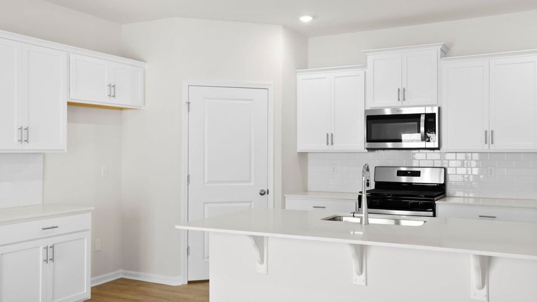 Furnished interior view inside a new home in Hunters Ridge, Woodruff (Image 9).