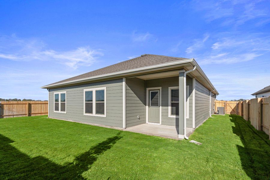 Rear of Home and Private Backyard