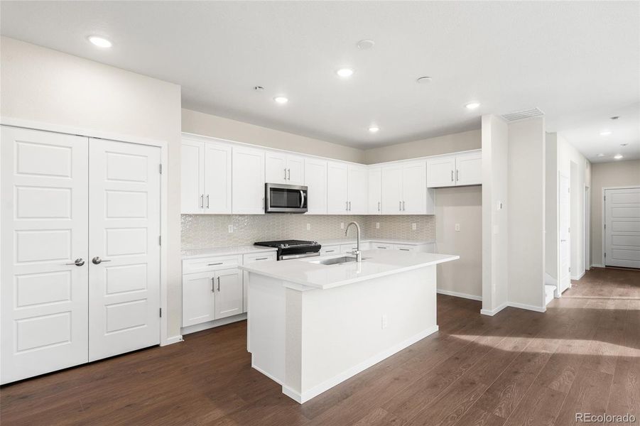 Furnished interior view inside a new home in Painted Prairie, Aurora (Image 6).