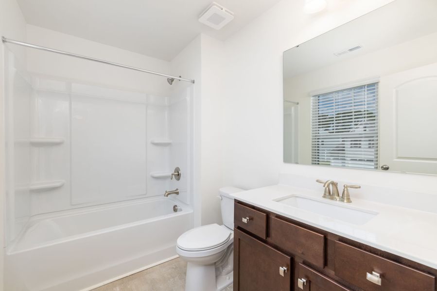 Furnished interior view inside a new home in Tanglewood East, Angier (Image 23). Furnished interior view inside a new home in Tanglewood East, Angier (Image 23).