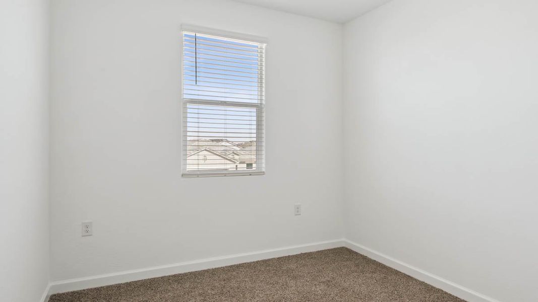 Representative unfurnished interior of a home built from the Mitchell by D.R. Horton in Upper Canyon, Phoenix (Image 29).