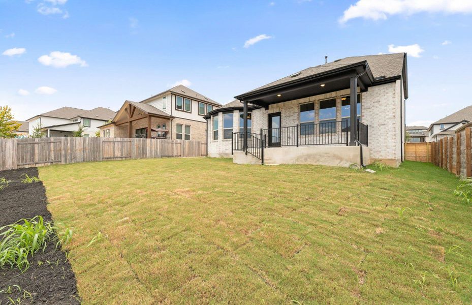 Exterior details and patio area of a home in Bluffview Reserve, Leander (Image 3).